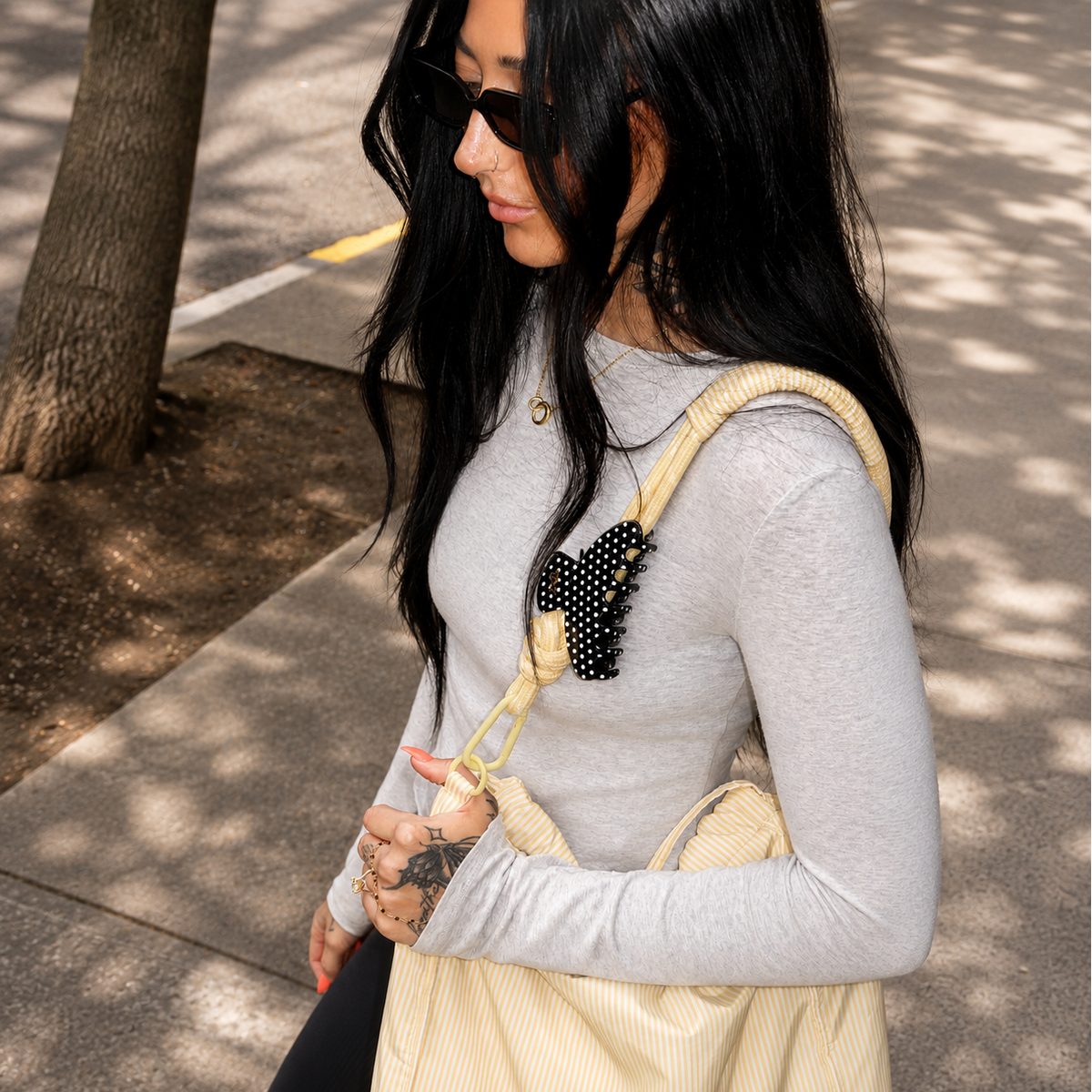 Vanessa, outside with dotty clip on bag