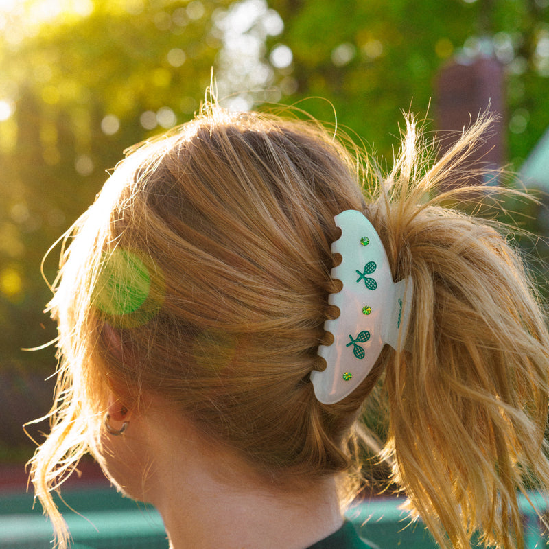 Devon wearing the love love hair clip from yello salon