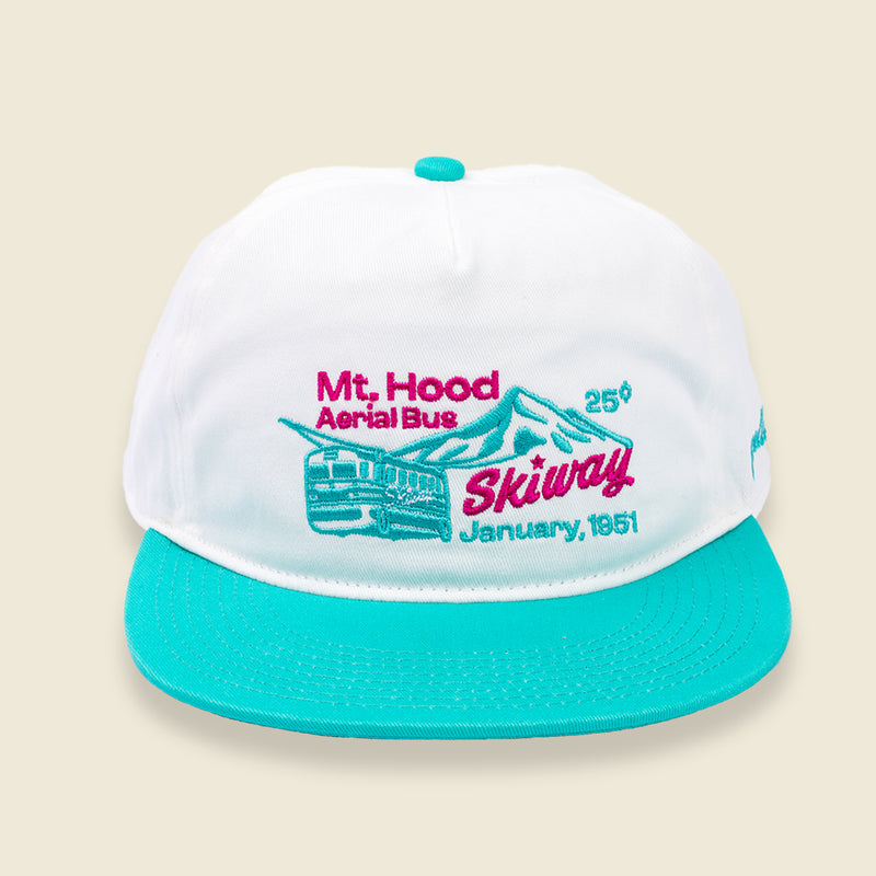 Skiway hat front view by yello salon Portland