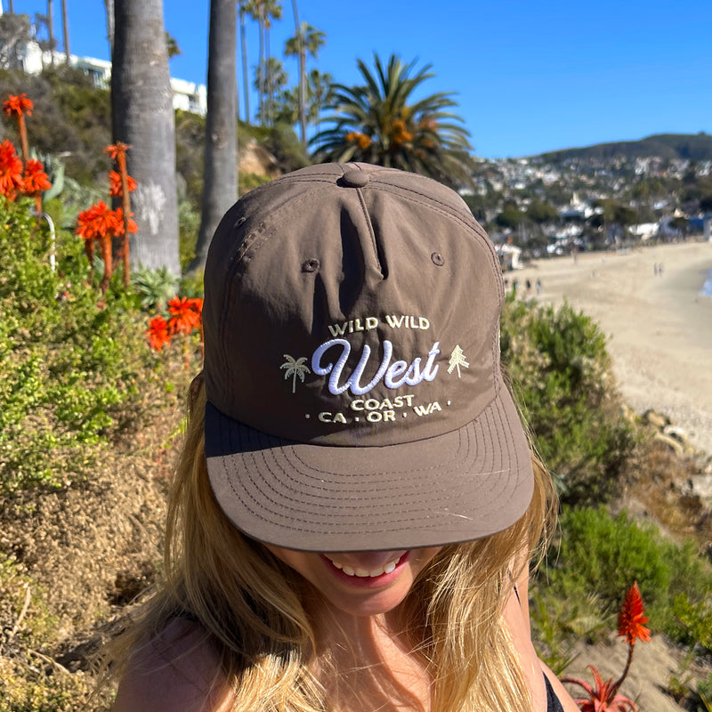 Kaylee wearing the Wild Wild West Coast hat by yello salon